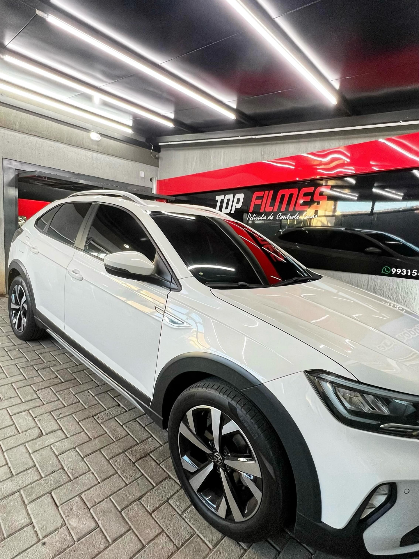 VW Nivus branco com película aplicada nos vidros na Top Films